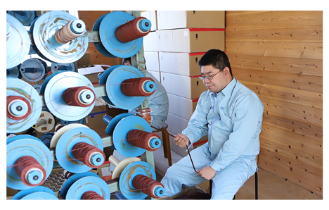 糸の巻取り作業